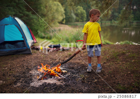 happy children hiking in the forest 25086817