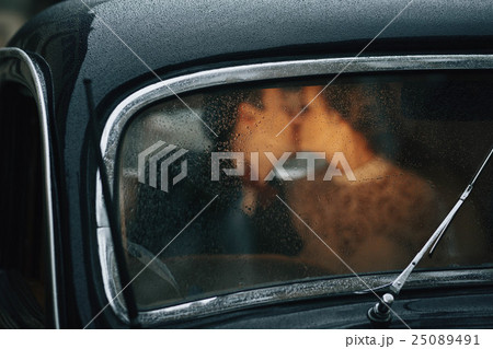 young and beautiful couple sitting in the cortege young and beautiful couple sitting in the cortege 25089491