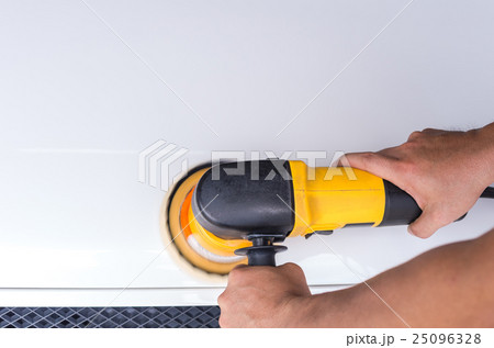 Polishing the white car with reflection, car care concept Polishing the white car with reflection, car care concept 25096328
