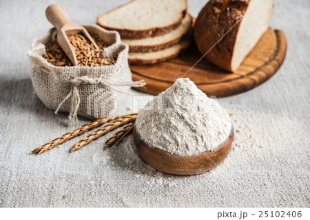 Wheat and flour on the table Wheat and flour on the table 25102406