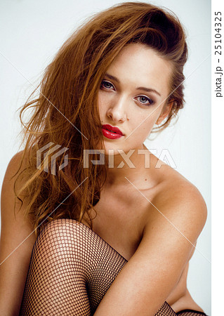 Sexy young real woman in black pantyhose and 25104325