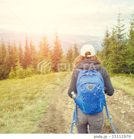 Young backpacker woman enjoying mountain trip Young backpacker woman enjoying mountain trip 25112979
