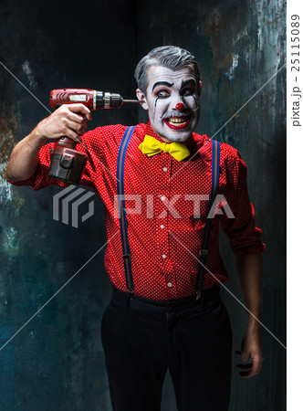 The scary clown and electric drill on dack The scary clown and electric drill on dack 25115089