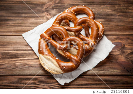 Pretzels on wooden table Pretzels on wooden table 25116801