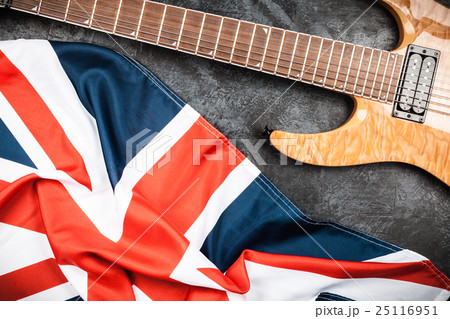 Electric guitar on grey background 25116951