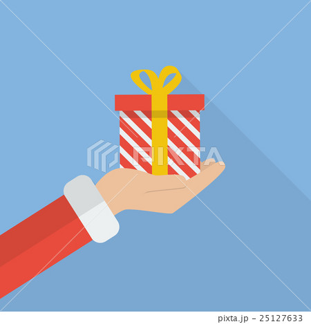 Santa hand holding christmas gift box 25127633
