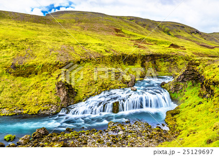 One of numerous waterfalls on the Skoga River - 25129697