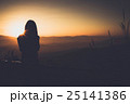 Single adult woman silhouette and sunset 25141386