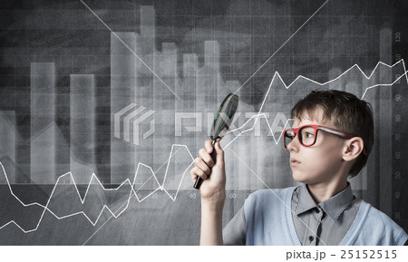 Curious school boy with magnifier Curious school boy with magnifier 25152515