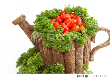 group of red tomato in wooden pot on white 25154550