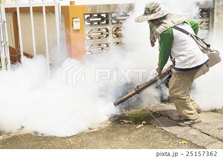 Man using thermal fog machine to protect mosquito 25157362