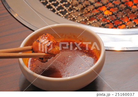 ホルモンの炭火焼き 25160037