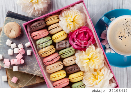 Colorful macaroons, coffee. Sweet macarons Colorful macaroons, coffee. Sweet macarons 25168415