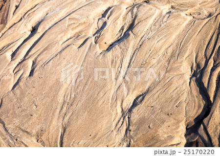 Sand surface with the relief formed by water  25170220