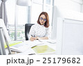 Asian businesswoman at office desk writing 25179682