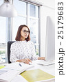 Asian businesswoman working at computer in office 25179683
