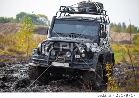 Russian off road car UAZ in mud Russian off road car UAZ in mud 25179717