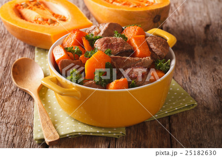 Braised beef with pumpkin, onion and spices Braised beef with pumpkin, onion and spices 25182630