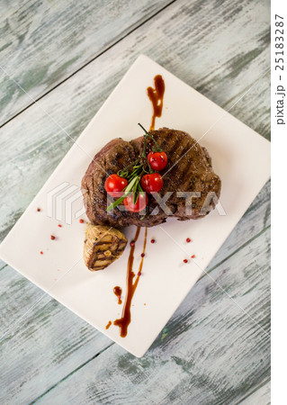 Cooked meat on plate. Cooked meat on plate. 25183287