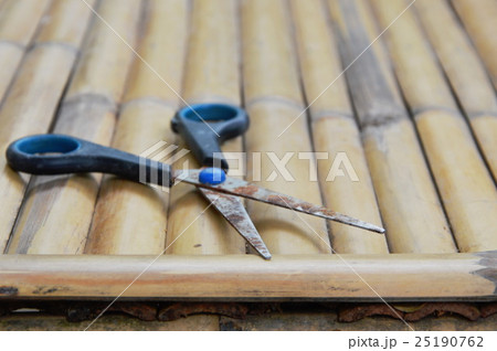 scissor on bamboo table scissor on bamboo table 25190762