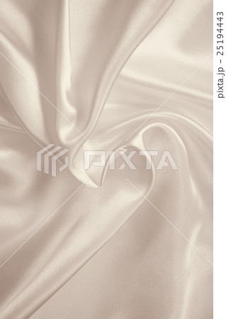Smooth elegant golden silk or satin Smooth elegant golden silk or satin 25194443