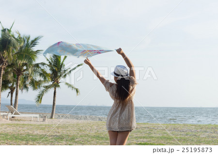 woman on the beach with scarf woman on the beach with scarf 25195873