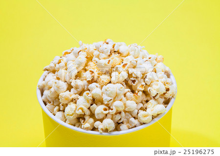 Yellow background of popcorn in a pack Yellow background of popcorn in a pack 25196275