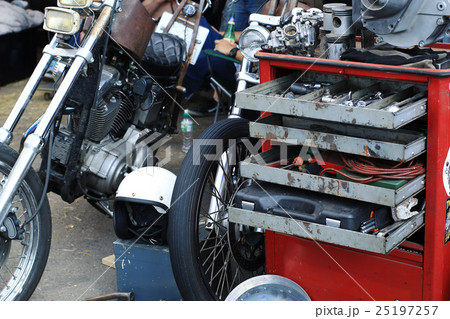 Old garage for a motorcycle repair with the tool b Old garage for a motorcycle repair with the tool b 25197257