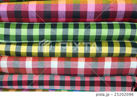 Traditional clothes are sold in shop in Myanmar. 25202096