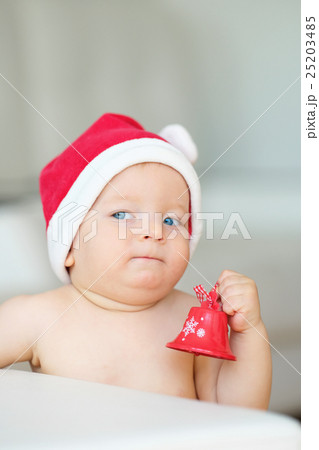 Baby christmas portrait in Santa Claus hat 25203485