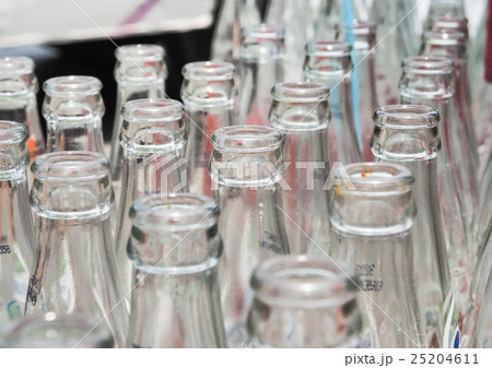 Close up detail of used glass bottles 25204611