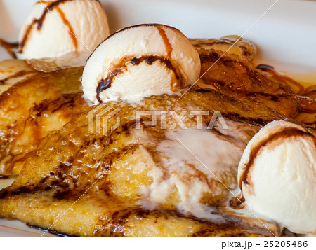 French pancakes ice cream with  honey and caramel 25205486