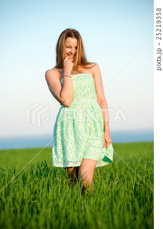 Happy vitality freedom girl stands with her hands 25219358