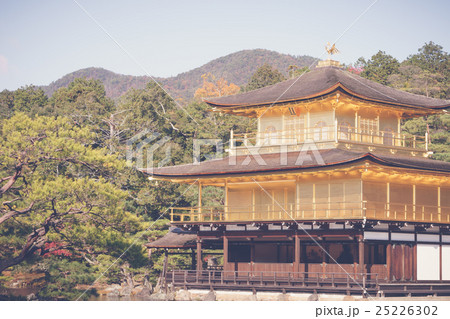 Kinkakuji Temple " The Golden Pavilion" in Kyoto, Japan ( Filtered image processed vintage effect. ) Kinkakuji Temple " The Golden Pavilion" in Kyoto, Japan ( Filtered image processed vintage effect. ) 25226302