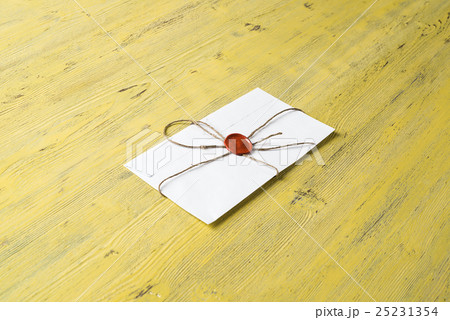 Letter with seal on table Letter with seal on table 25231354