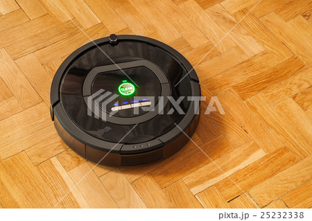 Robotic vacuum cleaner on parquet 25232338