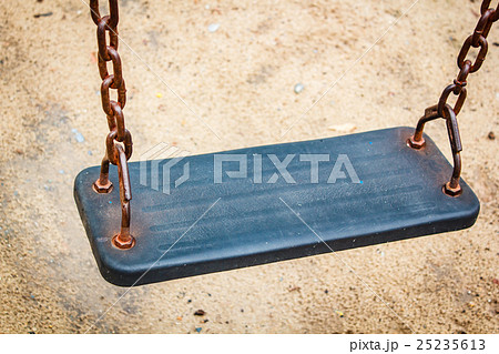 Empty swing on children playground. 25235613
