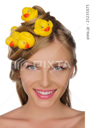 beautiful woman with yellow ducks in her hair 25235875