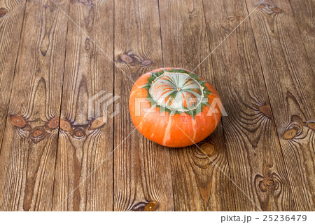Pumpkin on wooden board 25236479
