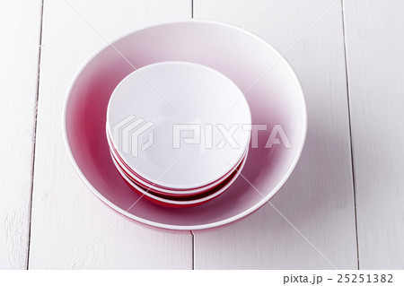 empty red Salad Bowl and cups empty red Salad Bowl and cups 25251382
