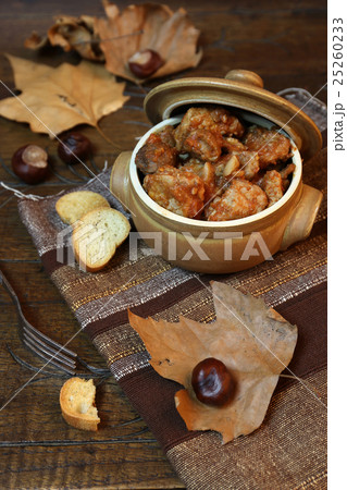 Pork stew with chestnuts and autumn leaves 25260233