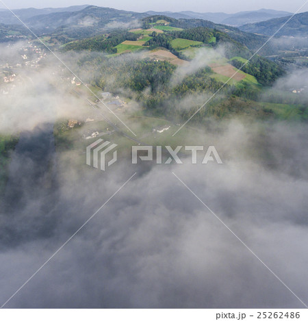 Landscape misty panorama.  25262486
