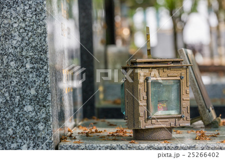 candle lantern on the stone grave candle lantern on the stone grave 25266402