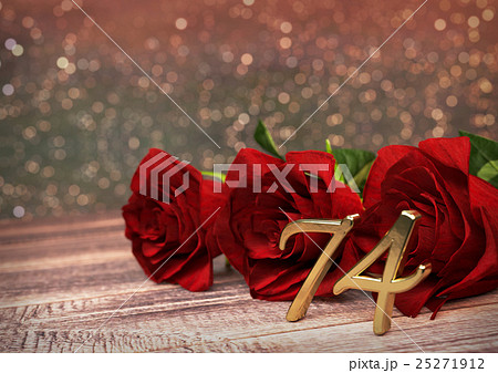 birthday concept with red roses on wooden desk birthday concept with red roses on wooden desk 25271912