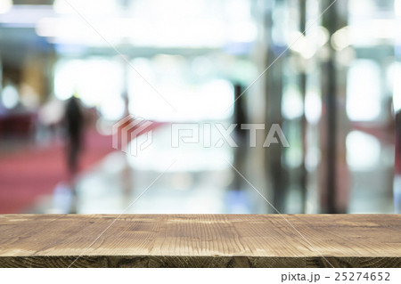 Wooden table and blurred background 25274652