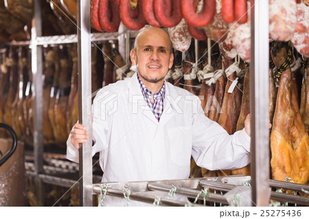 technologist posing with wurst and jamon technologist posing with wurst and jamon 25275436