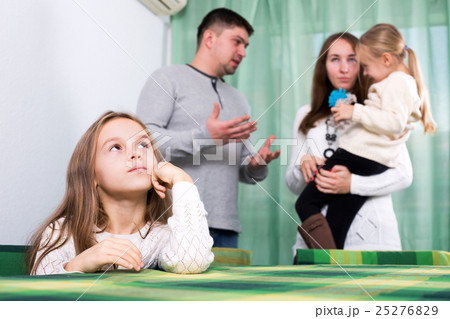 Family of four having quarrel at home 25276829