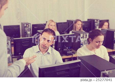 Angry manager displeased of employees 25277041