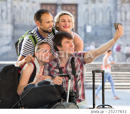 Happy group of tourists doing selfie 25277631