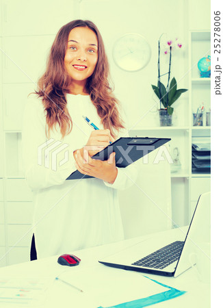 young woman employee in office. young woman employee in office. 25278006